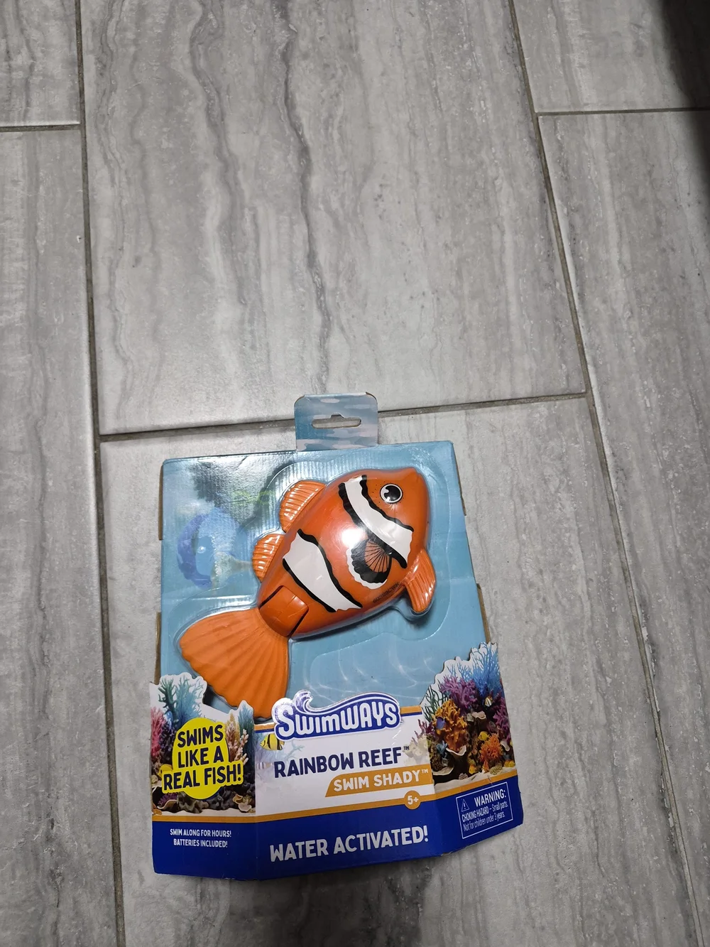 Swimways Rainbow Reef Swim Shady Water-Activated Orange Clownfish Toy 5+